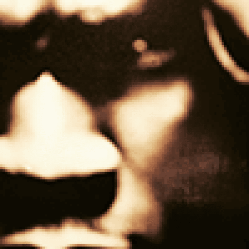 LettsArt icon, man cropped into a small circle focused on his eye and nose